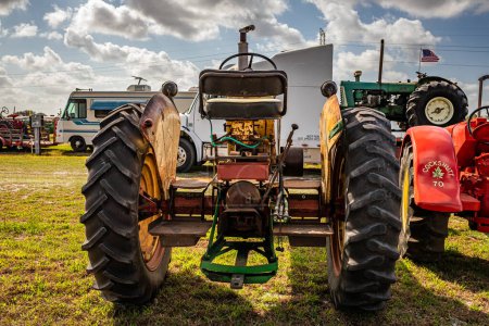 Photo for Fort Meade, FL - February 22, 2022: High perspective rear view of a 1964 Cockshutt Model 770 Standard Tractor at a local tractor show. - Royalty Free Image