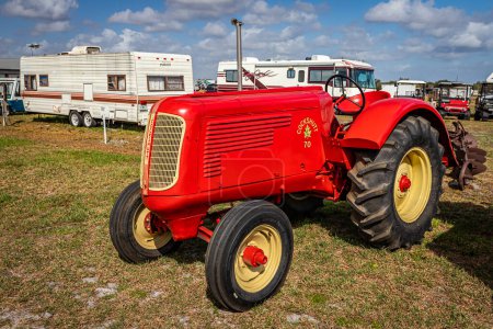 Photo for Fort Meade, FL - February 22, 2022: High perspective front corner view of a 1947 Cockshutt Model 70 Tractor at a local tractor show. - Royalty Free Image