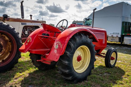 Photo for Fort Meade, FL - February 22, 2022: High perspective rear corner view of a 1947 Cockshutt Model 70 Tractor at a local tractor show. - Royalty Free Image