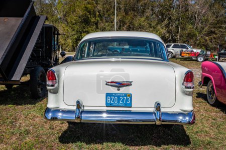 Photo for Fort Meade, FL - February 24, 2022: High perspective rear view of a 1955 Chevrolet Bel Air 4 Door Sedan at a local car show. - Royalty Free Image