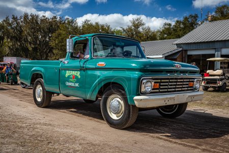 Photo for Fort Meade, FL - February 26, 2022: High perspective front corner view of a 1963 Ford F250 Pickup Truck at a local car show. - Royalty Free Image