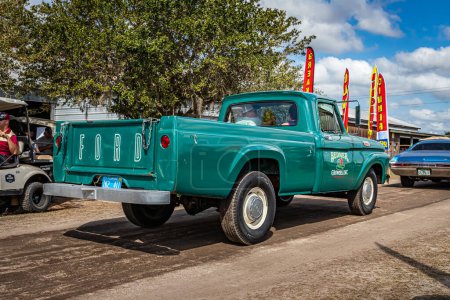Photo for Fort Meade, FL - February 26, 2022: High perspective rear corner view of a 1963 Ford F250 Pickup Truck at a local car show. - Royalty Free Image