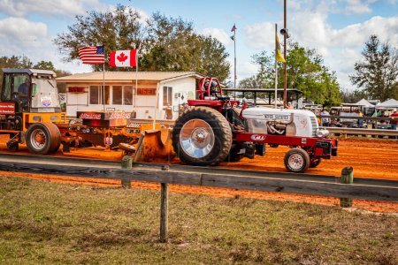 Photo for Fort Meade, FL - February 26, 2022: Wide angle front corner view of a Cockshutt 40 Tractor Puller at a local tractor pulling competition. - Royalty Free Image