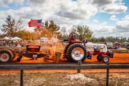 Photo for Fort Meade, FL - February 26, 2022: Wide angle side view of a Cockshutt 40 Tractor Puller at a local tractor pulling competition. - Royalty Free Image
