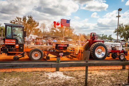 Photo for Fort Meade, FL - February 26, 2022: Wide angle side view of a Cockshutt 40 Tractor Puller at a local tractor pulling competition. - Royalty Free Image
