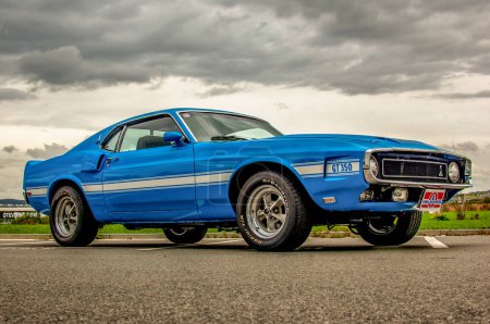 Photo for Blue muscle car with blue sky - Royalty Free Image