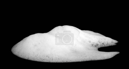 Photo for Liquid white foam from soap or shampoo or shower gel. Abstract bubbles. isolated on a black background - Royalty Free Image