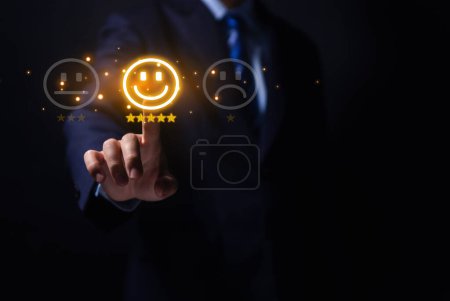Photo for Positive customer reviews touch the happiness icon and a five-star smiley face. Satisfaction survey concept, opinions, customer service The best response from the user experience of the prod - Royalty Free Image