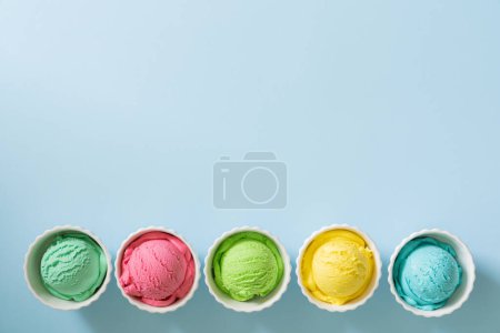 Foto de Colorful ice cream balls on bright background. High quality photo - Imagen libre de derechos