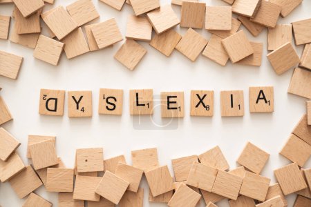 Photo for Dyslexia dysorder concept - letter on white background. top view - Royalty Free Image