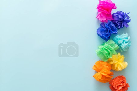 Photo for Birthday concept - garland on bright blue background, top view - Royalty Free Image