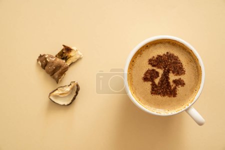 Mushroom coffee concept - mushroom shaped art on coffee cup. High quality photo
