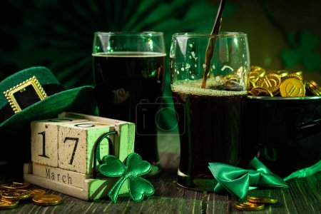 Photo for St Particks day concept - beer, pot of gold, calendar, hat, copy space - Royalty Free Image