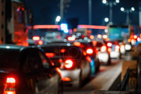 Photo for Blurred car traffic lights at night city. Traffic jam in evening rush hour. - Royalty Free Image