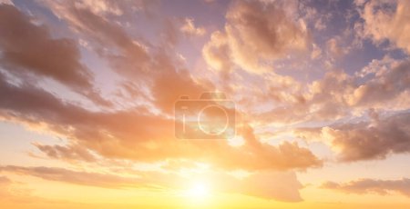 Photo for The rays of the sun breaking through the dramatic clouds in the evening or in the morning in the sunset or dawn sky. The concept of faith, hope for the best or good weather. - Royalty Free Image