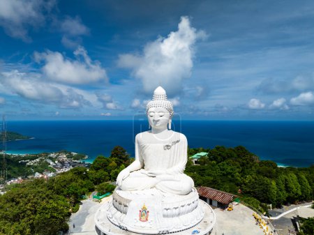 Vesak day background concept of Big buddha over high mountain in Phuket thailand Aerial view drone shot