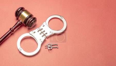 Photo for Gavel and handcuff - criminal justice concept banner. - Royalty Free Image