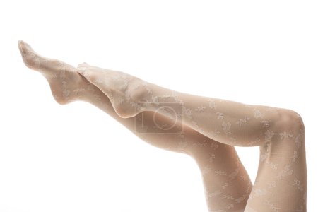 Téléchargez les photos : Longues jambes femelles assez lisses isolées sur fond blanc - en image libre de droit