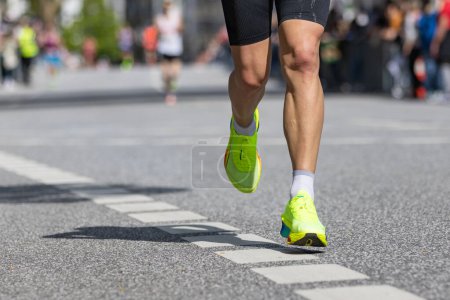 marathon runner with yellow running shoes