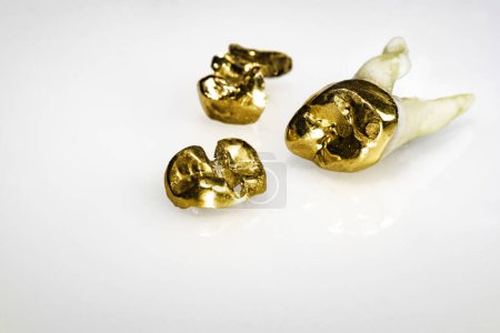 Cut out of used dental crowns made of gold