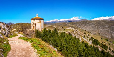 Photo for Santa Maria della Pieta church in Rocca Calascio - Abruzzo Gran Sasso national Park trail - South Italy landmark . - Royalty Free Image
