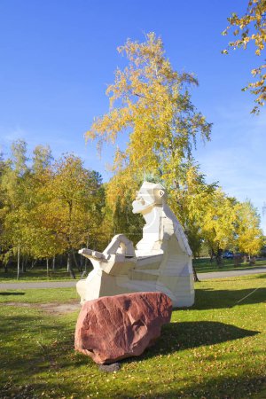 Photo for Troll Zen Wooden Sculpture of a Meditating Figure in park in Mezhyhirya (former ex-president residence of President Yanukovych) in Kyiv region, Ukraine - Royalty Free Image