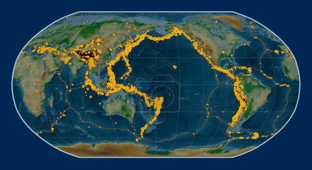 Foto de Ubicaciones de terremotos por encima de Richter 6.5 registradas desde principios del siglo XVII en el mapa de elevación física mundial en la proyección de Robinson centrada en la línea de fecha - Imagen libre de derechos