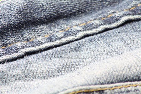 Téléchargez les photos : Gros plan sur les jeans bleus et les détails en denim. - en image libre de droit