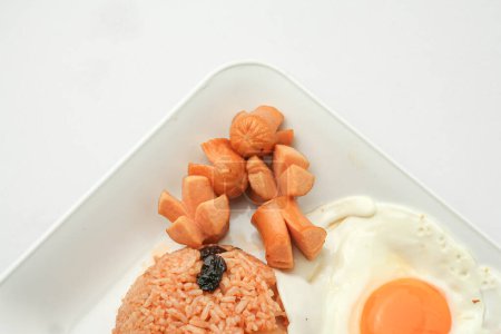 American style breakfast set,Fried rice with fried chicken ,sausage and vegetable on white plate
