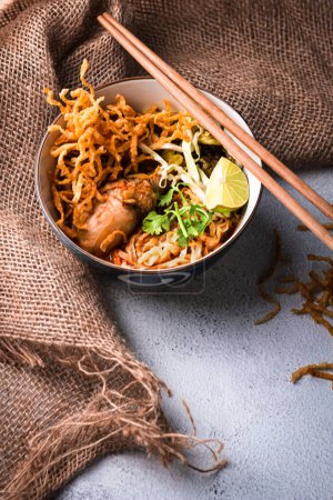 Khao Soi Kai or Khao Soi Gai, Northern Thai cuisine, Egg noodles with spicy yellow curry and chicken