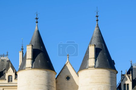 Photo for This landscape photo was taken, in Europe, in France, in ile de France, in Paris, on the banks of the Seine, in summer. We see La Conciergerie on the ile de la Cite, under the Sun. - Royalty Free Image