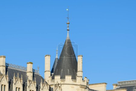 Photo for This landscape photo was taken, in Europe, in France, in ile de France, in Paris, on the banks of the Seine, in summer. We see La Conciergerie on the ile de la Cite, under the Sun. - Royalty Free Image
