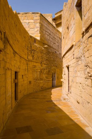 Photo for This landscape photo was taken in Asia, India, Rajasthan, Jaisalmer, Summer. We see The Alleys of the Fort of Jaisalmer, under the Sun. - Royalty Free Image