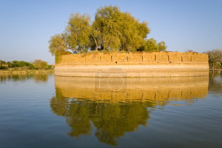 Photo for This landscape photo was taken in Asia, India, Rajasthan, Jaisalmer, Summer. We see Lake Gadisar Lake, under the Sun. - Royalty Free Image