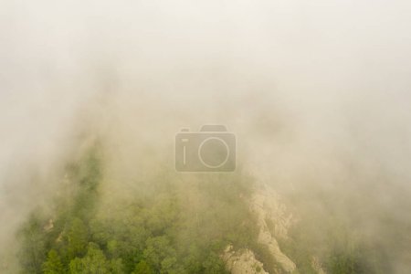 Photo for This landscape photo was taken in Europe, in France, in the Pyrenees, in summer. We see the green countryside under the clouds, under the Sun. - Royalty Free Image