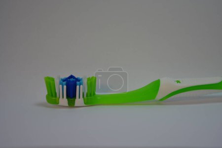 Things, personal hygiene products, new toothbrush placed on white background.