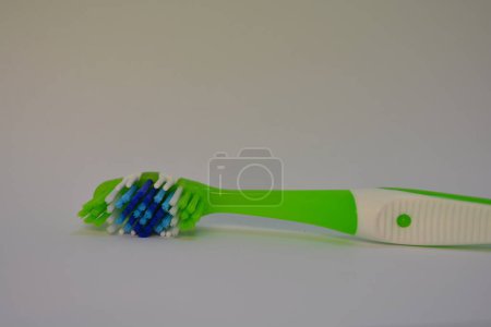 Things, personal hygiene products, new toothbrush placed on white background.