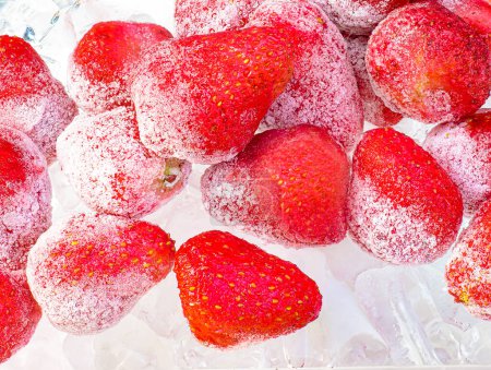Photo for An image close up red strawberry on the ice Is the fruit is a juicy with freezer tasty - Royalty Free Image