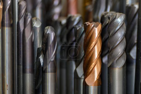 Close-up scene the group of used   cutter end mill tools. The  cutting  tool for machining center.