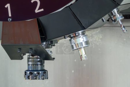 The indexable tool and face milling cutter with arbor installed at  the tool magazine of machining center. The automatic toll change ,ATC operation concept on the CNC milling machine.