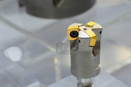 Close up the milling indexable tool. The cutting tool manufacturing concept.