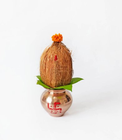 Photo for Indian festival akshaya tritiya concept : Decorative kalash with coconut and leaf with floral decoration - Royalty Free Image