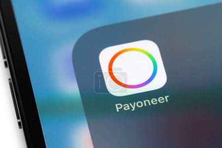 Photo for Payoneer logo mobile app on screen smartphone iPhone closeup. Payoneer - payment system. Batumi, Georgia - July 24, 2022 - Royalty Free Image