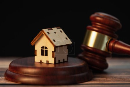 Photo for Judge gavel with wooden house. Concept of law system, real estate auction, division of property - Royalty Free Image