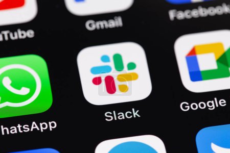 Photo for Slack mobile icon app on the screen smartphone iPhone closeup. Slack is a corporate messenger. Batumi, Georgia - March 1, 2023 - Royalty Free Image