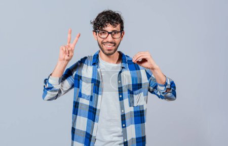 Photo for Interpreter man gesturing LOVE AND PEACE in sign language isolated. Smiling person gesturing anir and peace in sign language, Young man gesturing LOVE AND PEACE in sign language - Royalty Free Image