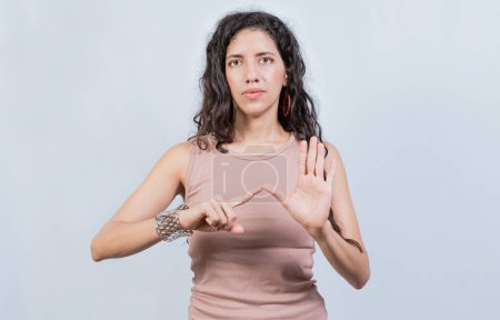 Photo for Lating girl gesturing in sign language isolated. Young woman gesturing in sign language, People speaking in sign language isolated - Royalty Free Image