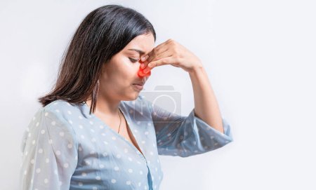 Photo for Young woman with pain touching nose. Person with nasal bridge pain, Girl with nasal bridge headache. Sinus pain concept - Royalty Free Image