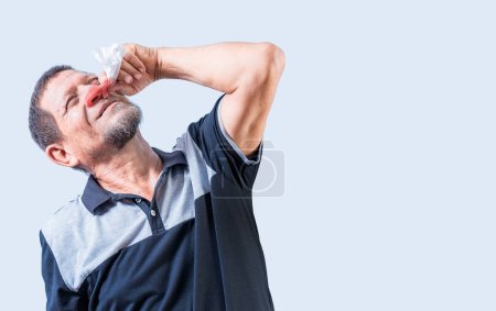 Photo for Senior man with irritated nose isolated. man with red nose cold, Concept of sinusitis. Person with nasal congestion - Royalty Free Image