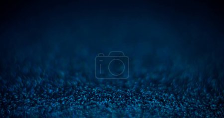 Photo for Blur color glow. Placement background. Night light flare. Defocused neon blue shiny sparkles on dark black abstract grain texture copy space wallpaper. - Royalty Free Image